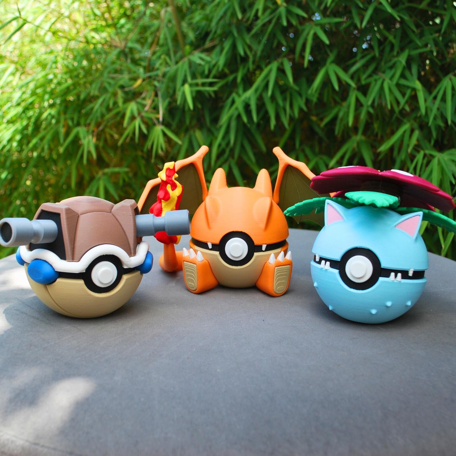 Charizard, Blastoise and Bulbasaur Pokeball display pieces