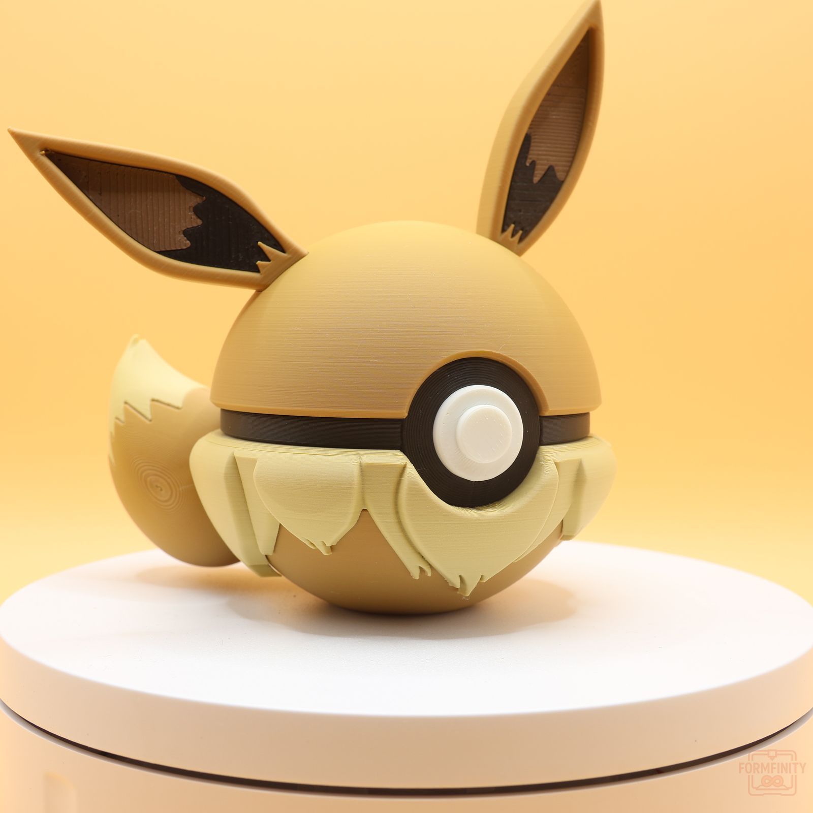 Eevee-themed Poke Ball collectible display, 3D printed by Formfinity
