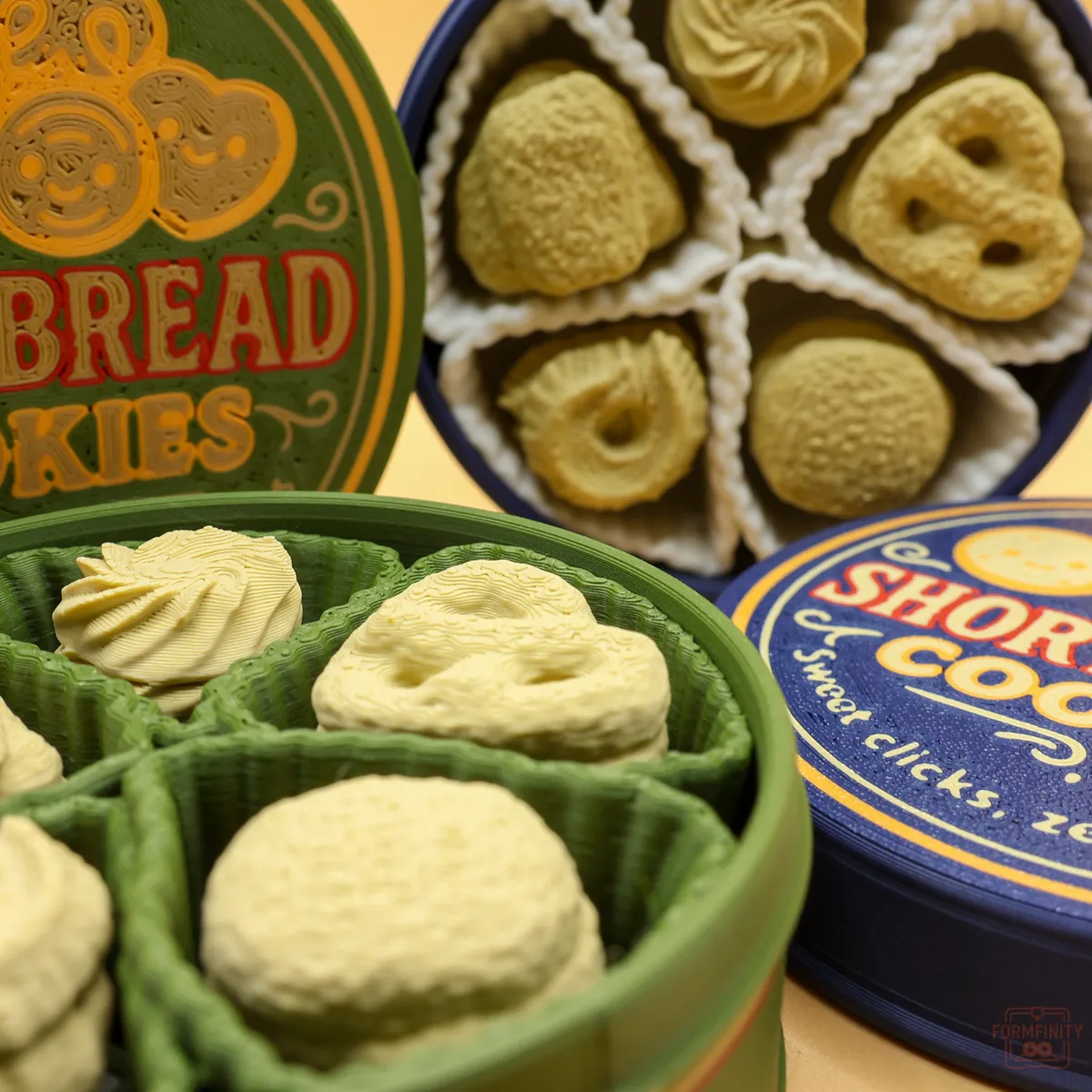 Two 3D printed shortbread cookie tins with clickable shortbread cookies