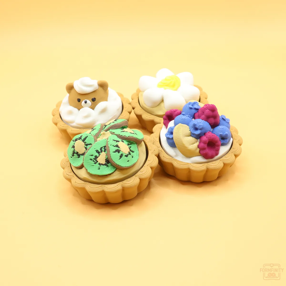 3D printed dessert tart fidget keychains - berry, custard, kiwi and cream bear designs