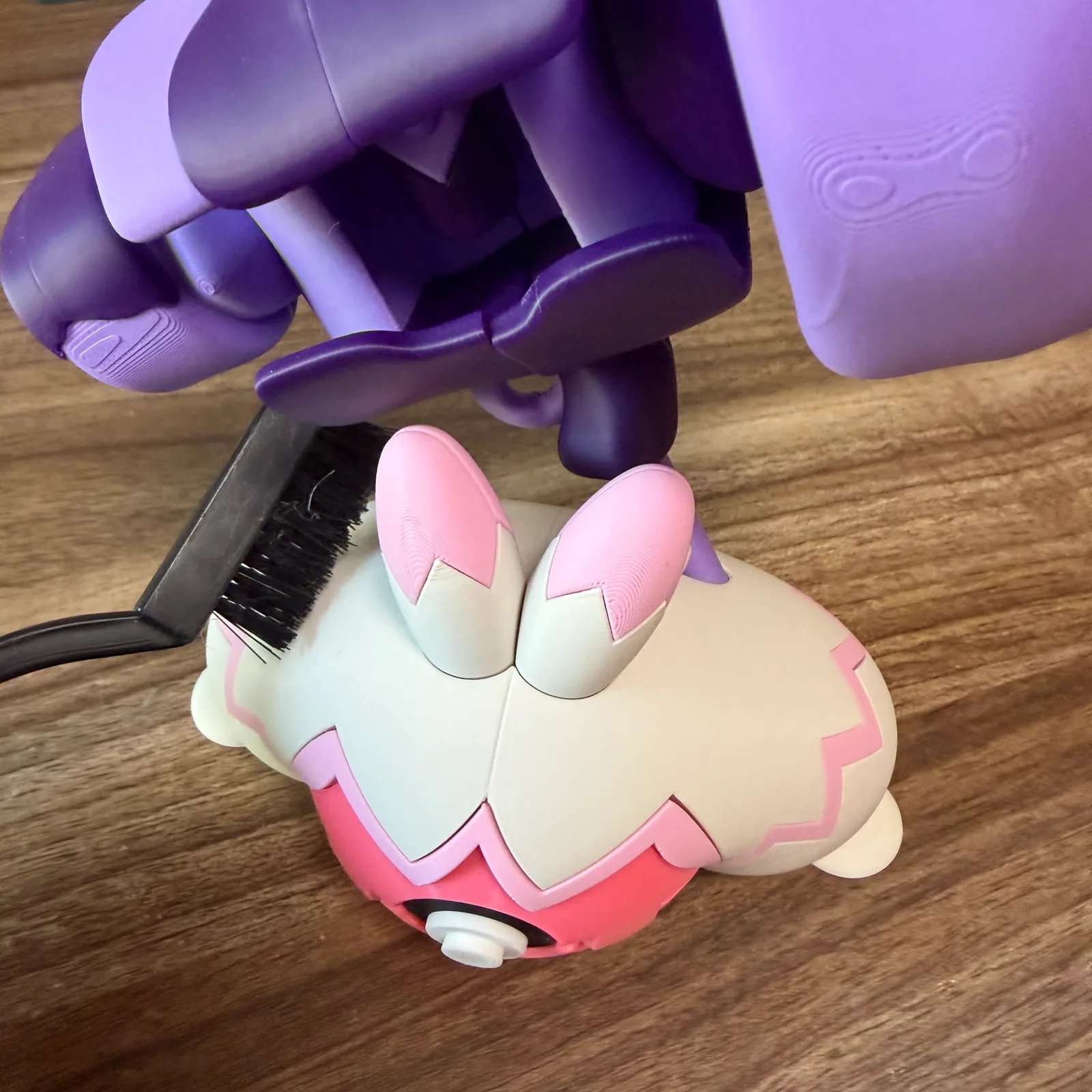 Cleaning a 3D printed display piece with a soft cloth